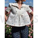 Double gauze geborduurde bloemen- double gauze