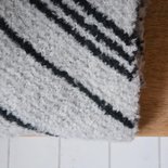 Breipakket bouclé sjaal grijs/zwart